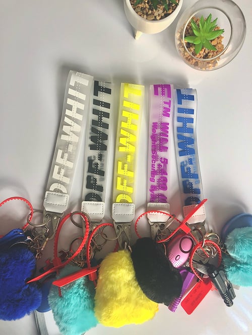 Image of Off white wristlet