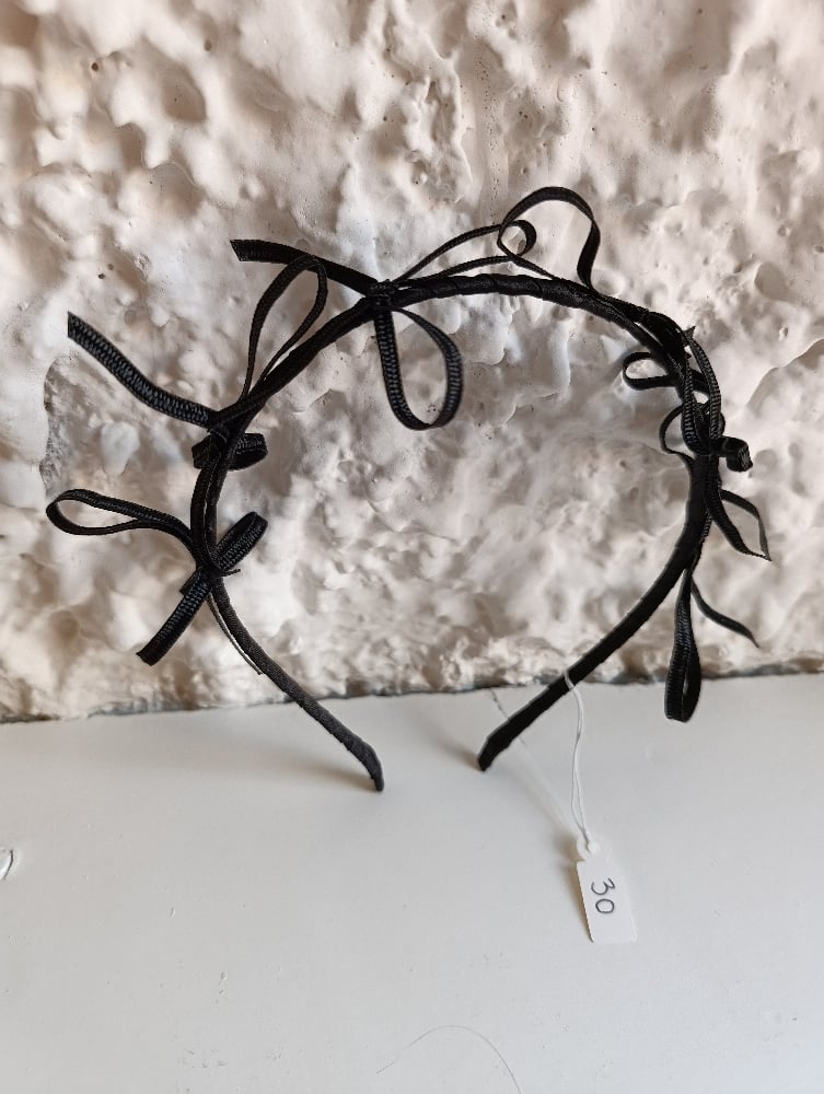 Image of Cerchietto nero tanti fiocchetti