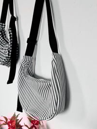 Image 3 of black and white crescent bags
