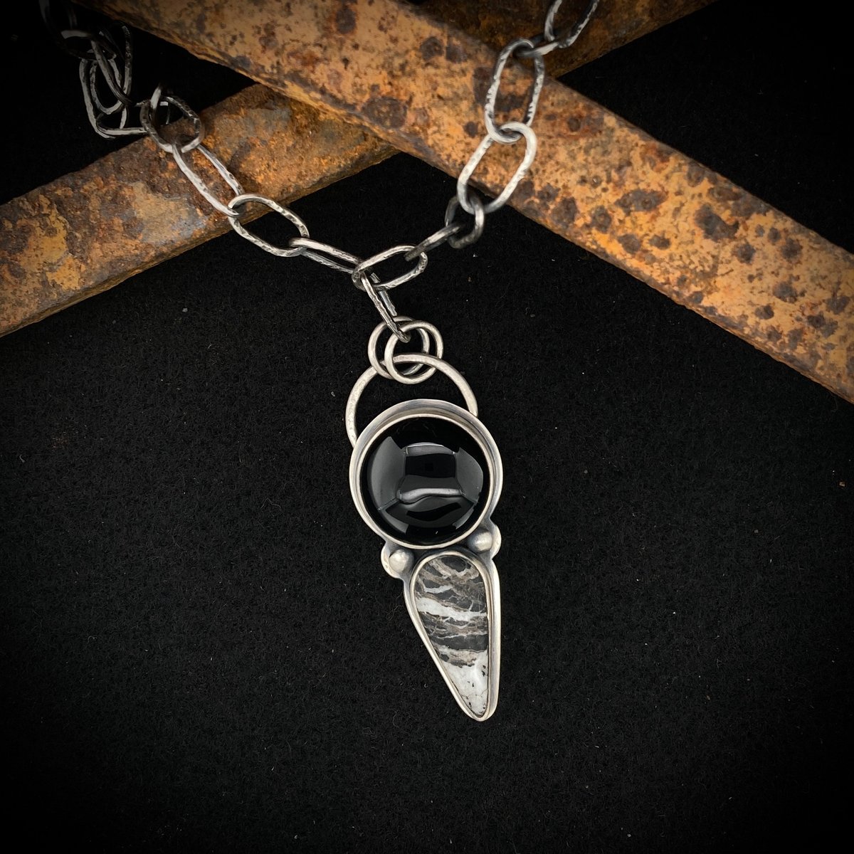 White Buffalo and Black Onyx Pendant