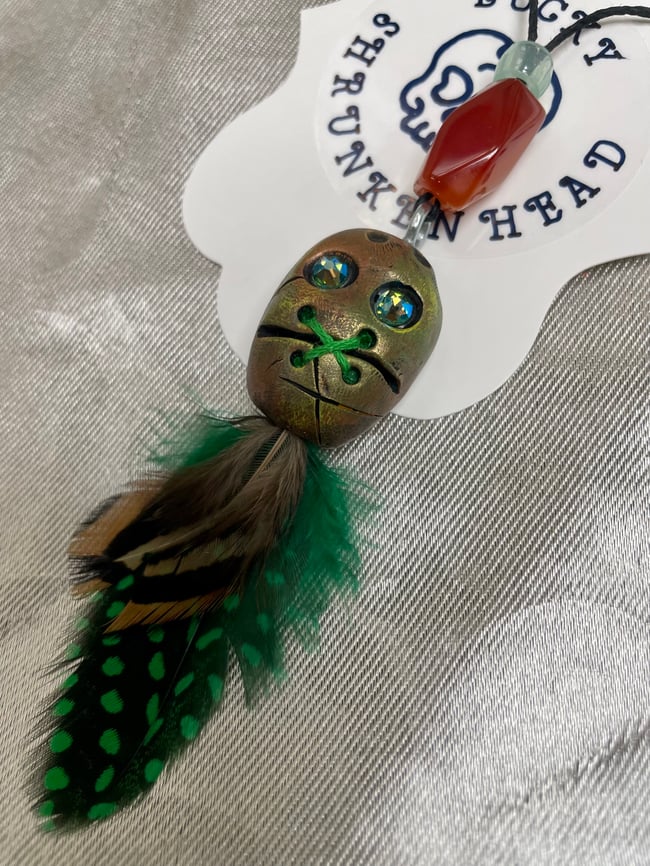 Lucky Shrunken Head- swamp water