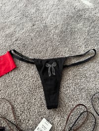 Black diamond bow thong 