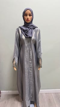 Image 2 of Korean shimmer fabric Flared sleeve abaya Gray close come with a matching scarf 