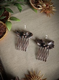 Decorative hair comb with real holly leaves