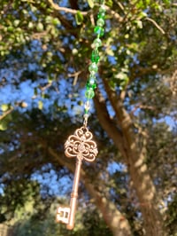 Image 1 of “Skeleton Key” Sun Catcher