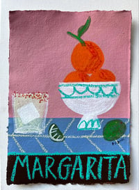 Margarita on pink with oranges 