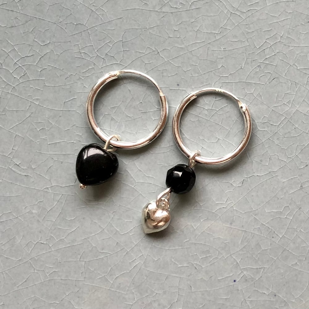 Image of 1 st silverörhänge onyxhjärta