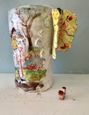 Image of Greenhouse garden  beaker, butterfly  handle