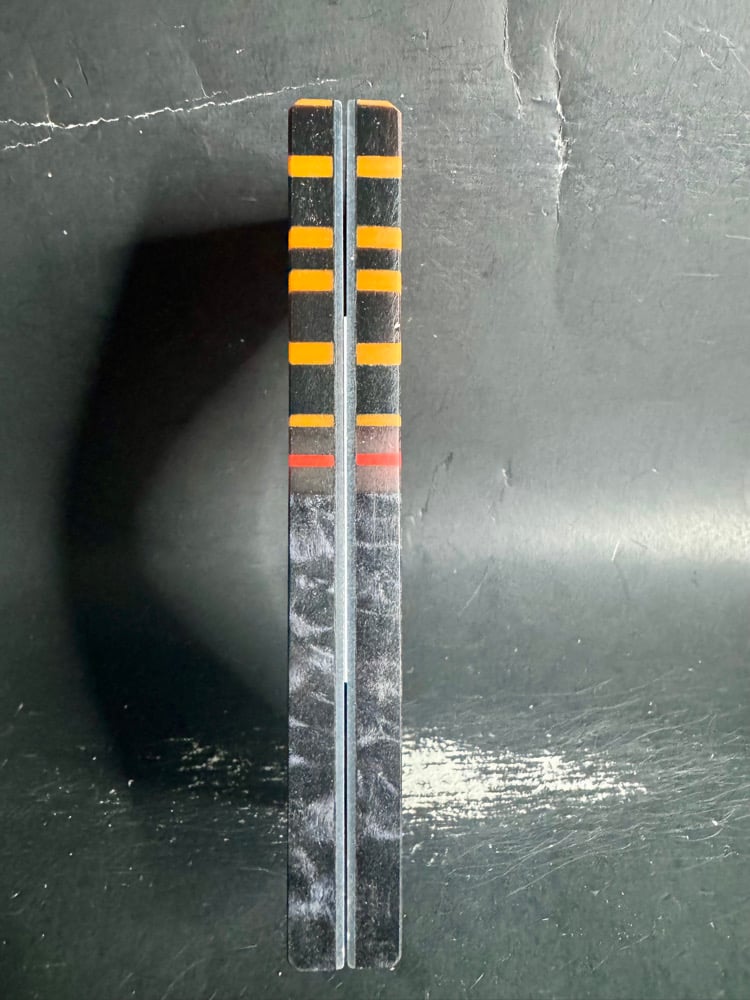 Image of @Kaoticartworks Resin & Black Curly Cottonwood GLOW Segmented Knife Scales