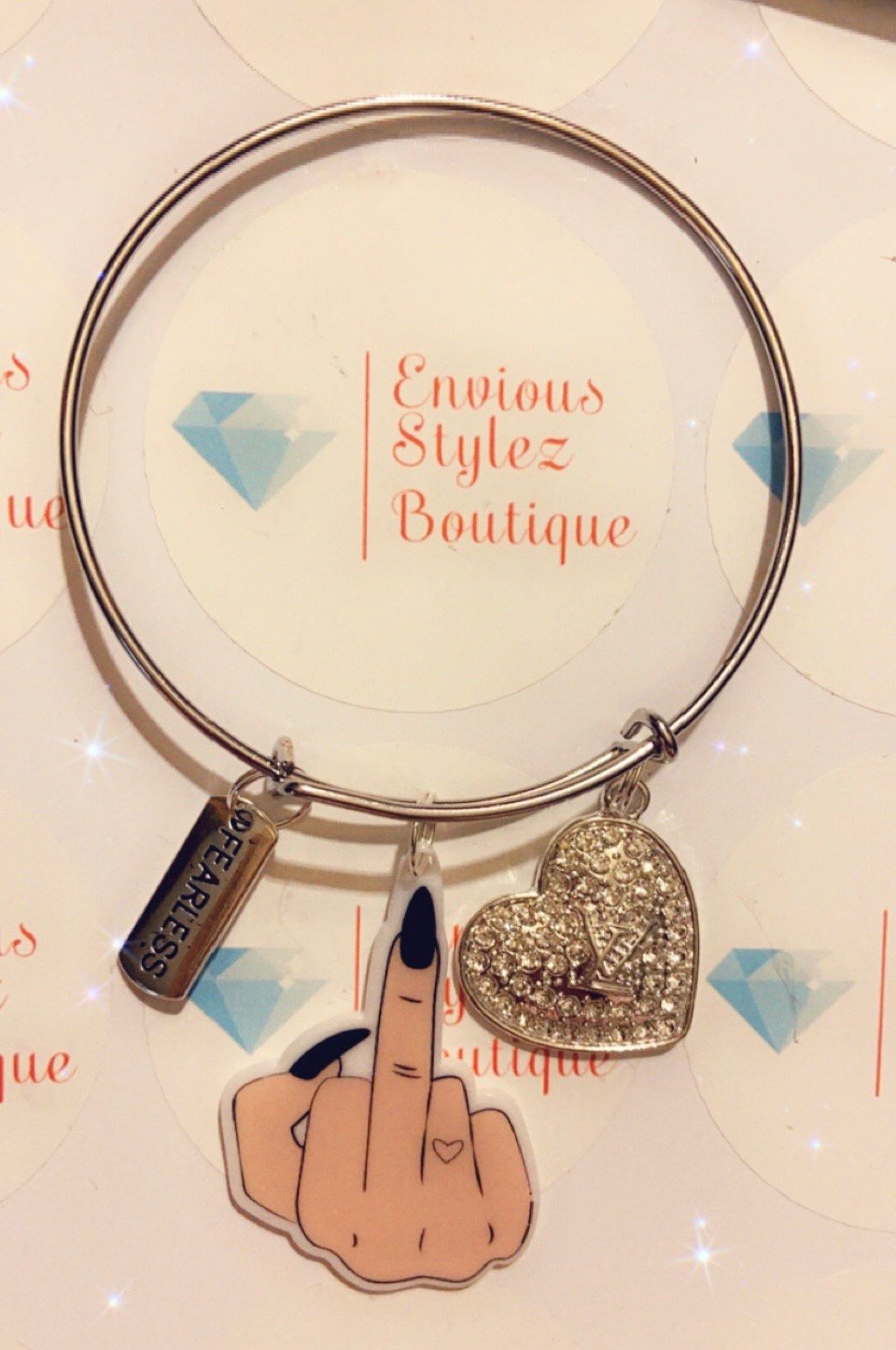 Image of Fearless middle finger bangle charm bracelet 