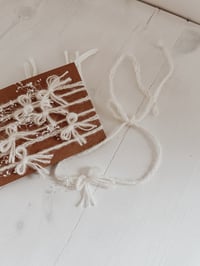 Image 2 of braided mohair bow