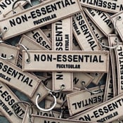 Image of NON-ESSENTIAL flight tag