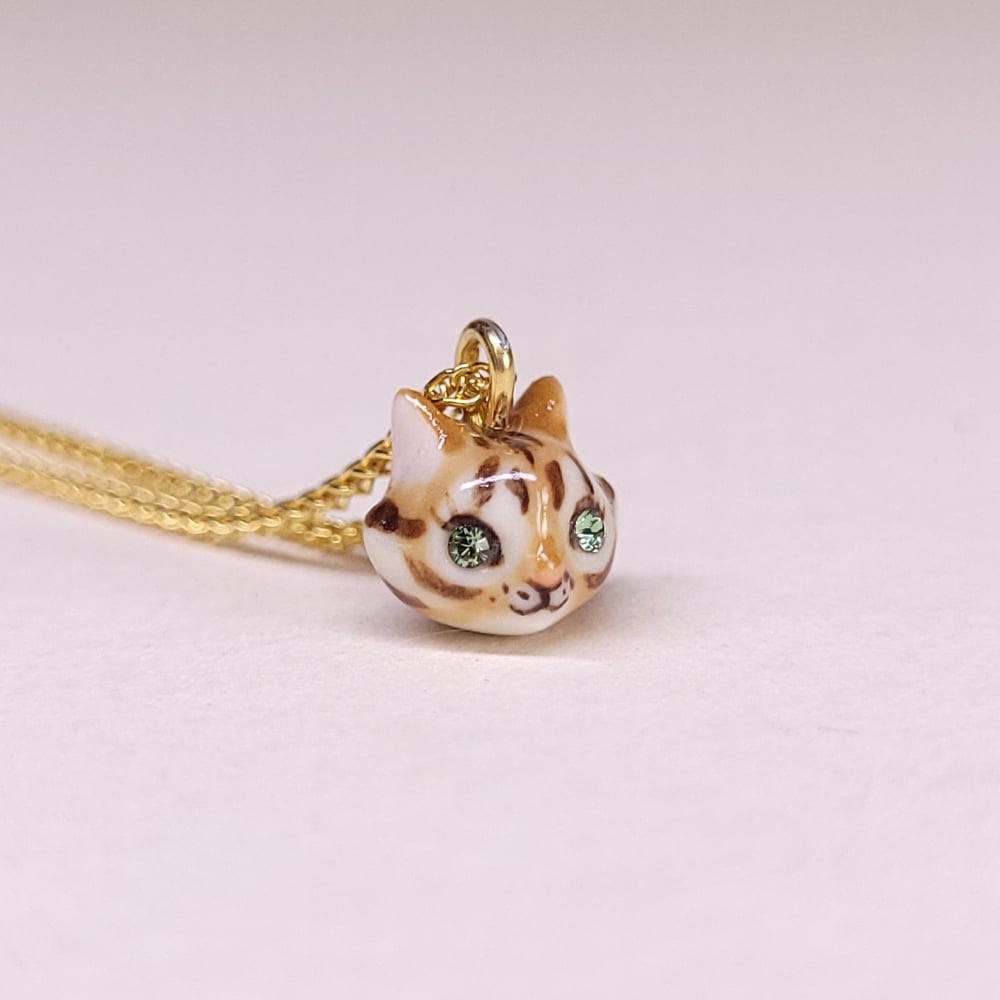 Image of Bengal Porcelain & Gold Vermeil Teeny Tiny Cat Pendant