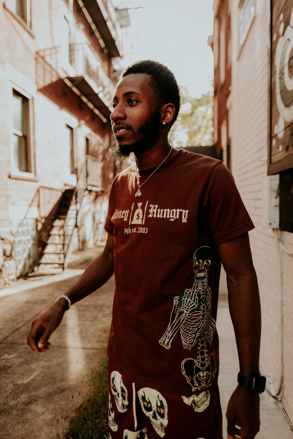 Image of Brown Money Hungry Skeleton Tee