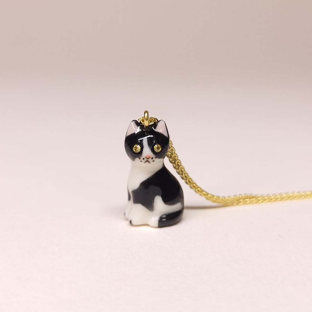 Image of Tuxedo Porcelain & Gold Vermeil Sitting Kitten Pendant