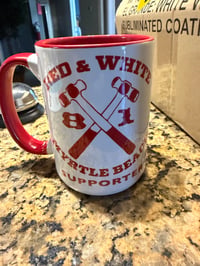 Red and white coffee cup 