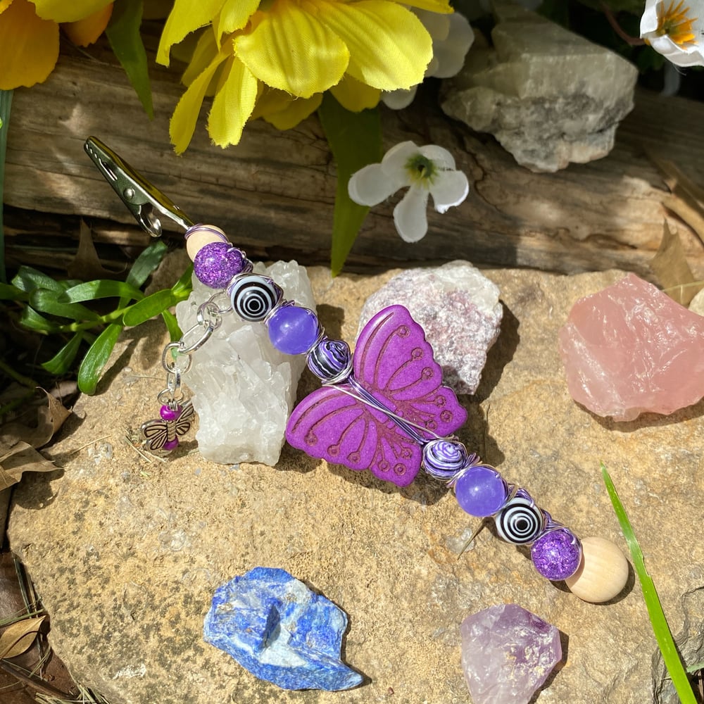 Image of lilac butterfly roach clip 