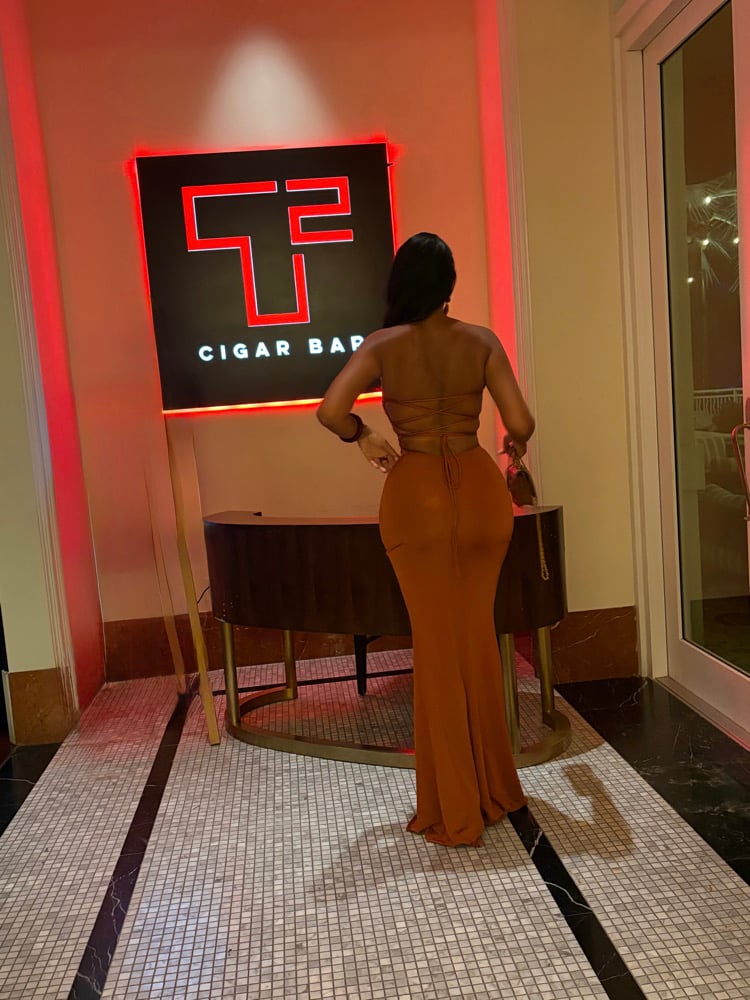 Image of RUST RUCHED STRAPLESS MAXI DRESS (SMALL)