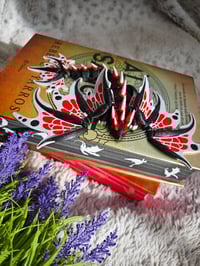Image 1 of Dragón Negro (purpurina) y Rojo