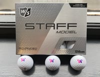 12 Wilson Staff golf balls 