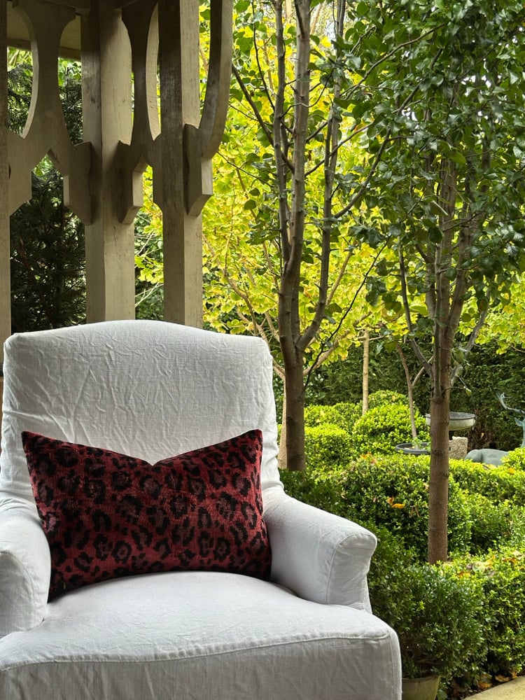 Image of Unexpected Red Leopard Ikat Cushion