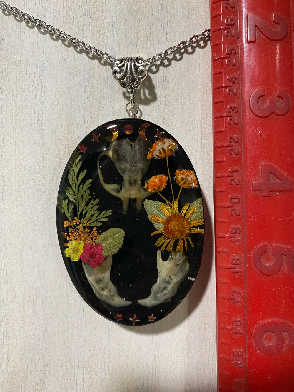 Rat skull and jawbone floral pendant 