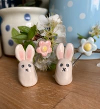 Image 2 of Ceramic Cute Bunny holding a pastel Flower