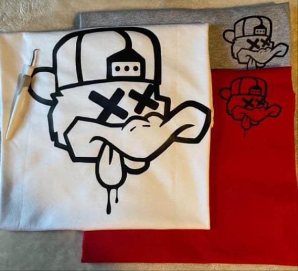 Image of Sitting duck pocket logo tee’s