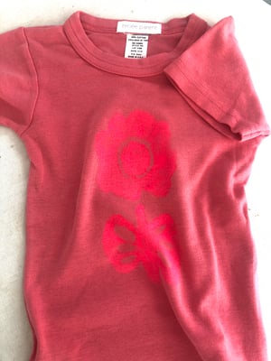 Image of hot pink hand printed flower baby tee