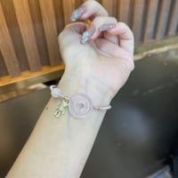 Image 1 of circle Pink quartz bracelet  粉晶平安扣小熊手绳