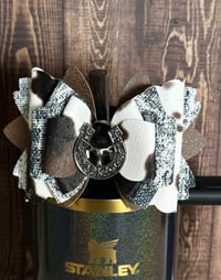 Image 1 of Western Themed Blue Jean and Cow Print Tumbler Straw Topper Bow