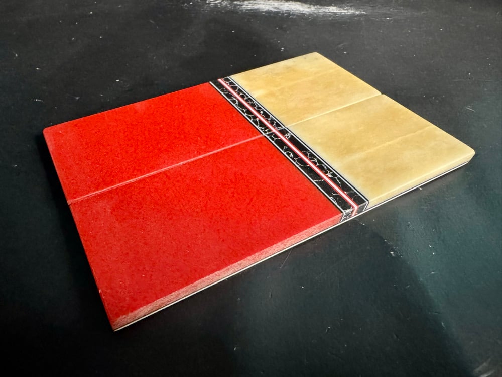 Image of White Giraffe Bone & Red Glass Segmented Knife Scales