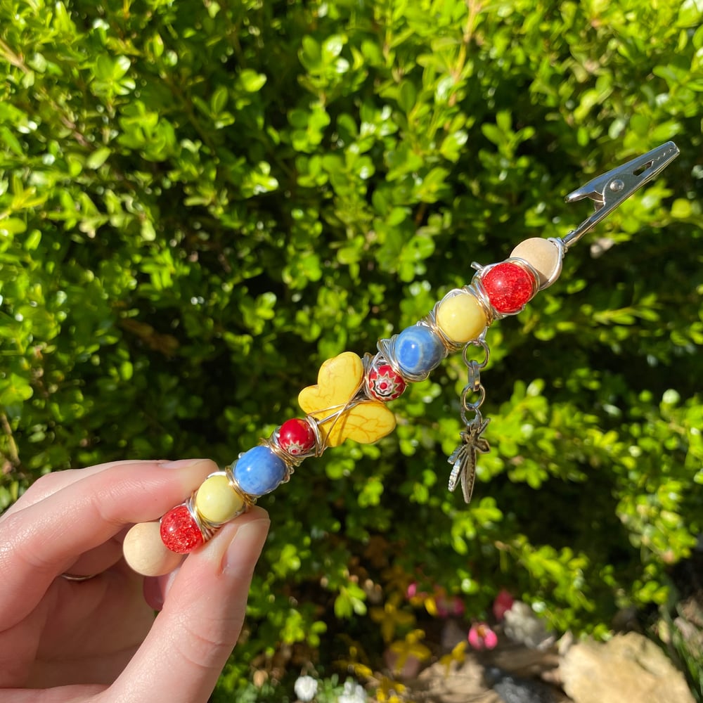 Image of summer butterfly roach clip