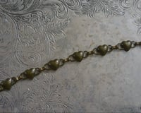 Image 2 of string of hearts bracelet 