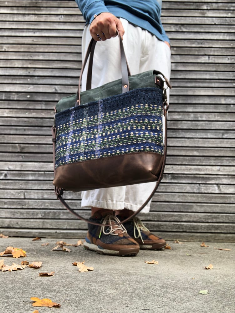 Image of  Waxed canvas carryall with handwoven exterior pocket in forest green