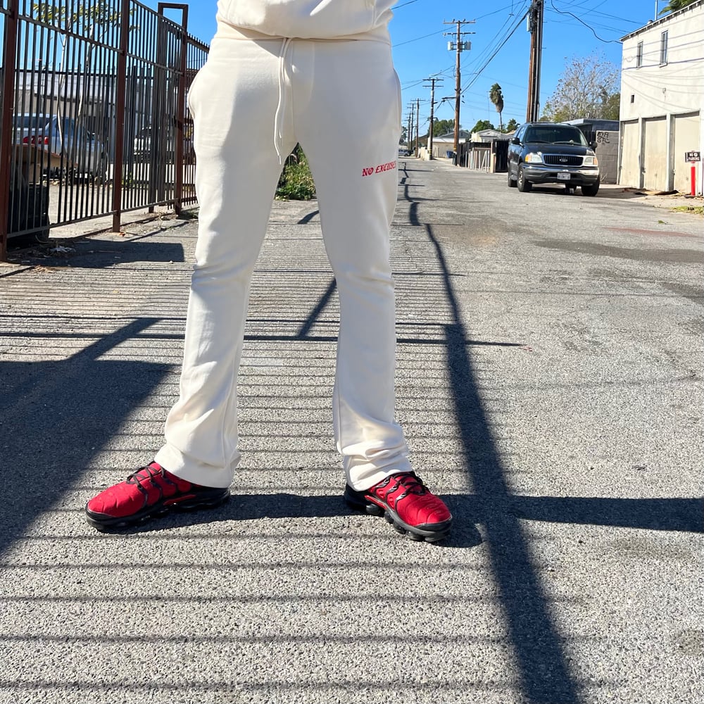 Image of A1$D1 No Excuses Stacked Sweats (Cream X Black X Red) 