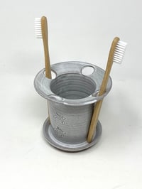 Image 1 of Four hole Toothbrush Holder turtle debossed