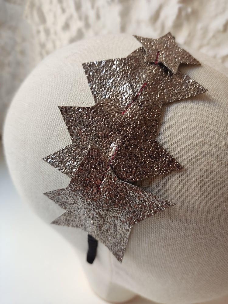 Image of Cerchietto stelle base nera