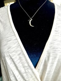 Image 11 of sterling silver moon pendant with brave inscription and green tourmaline