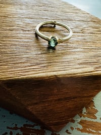 Image 13 of size 8 green tourmaline ring with sterling silver twig band