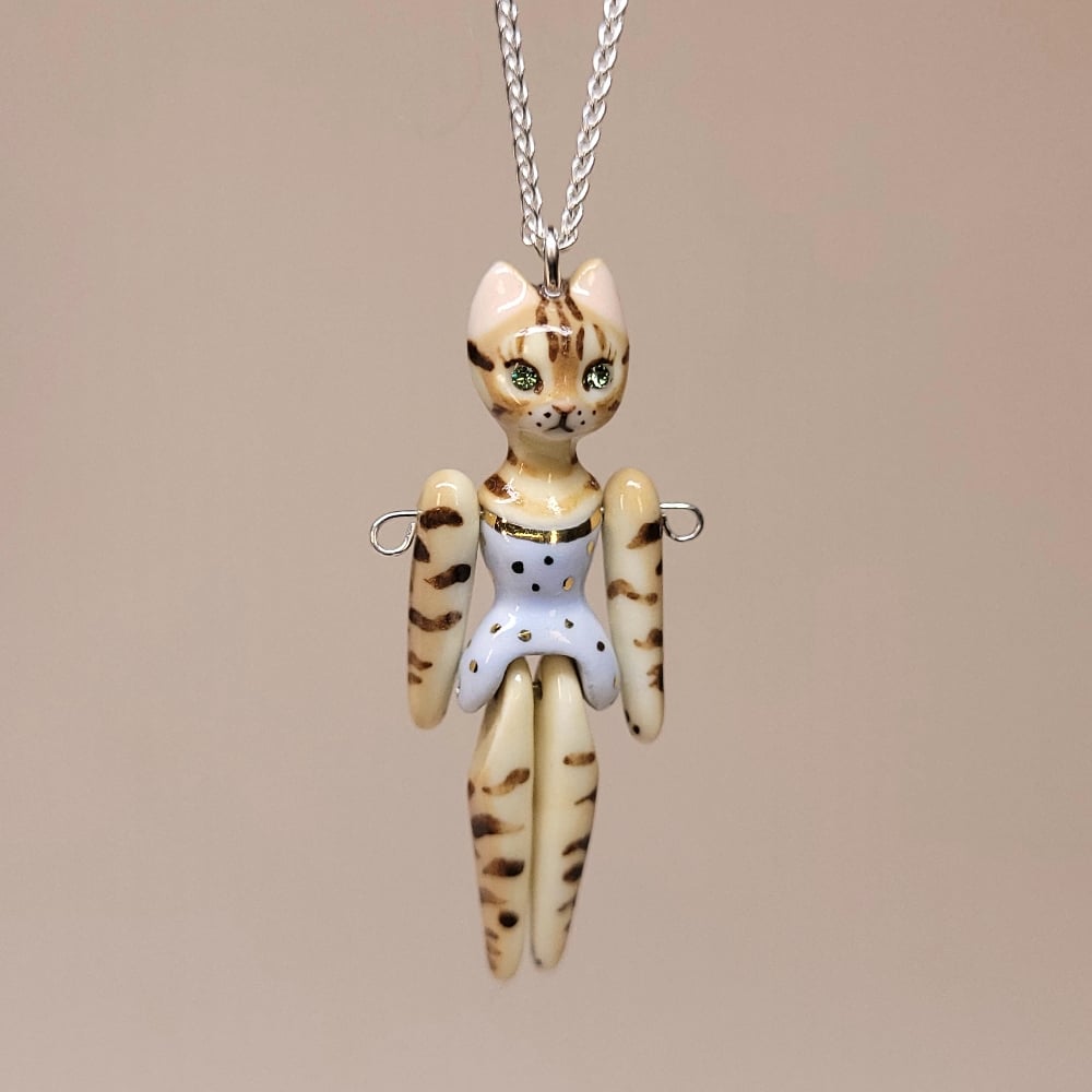 Image of Bengal Porcelain & Sterling Silver Articulated Doll Pendant