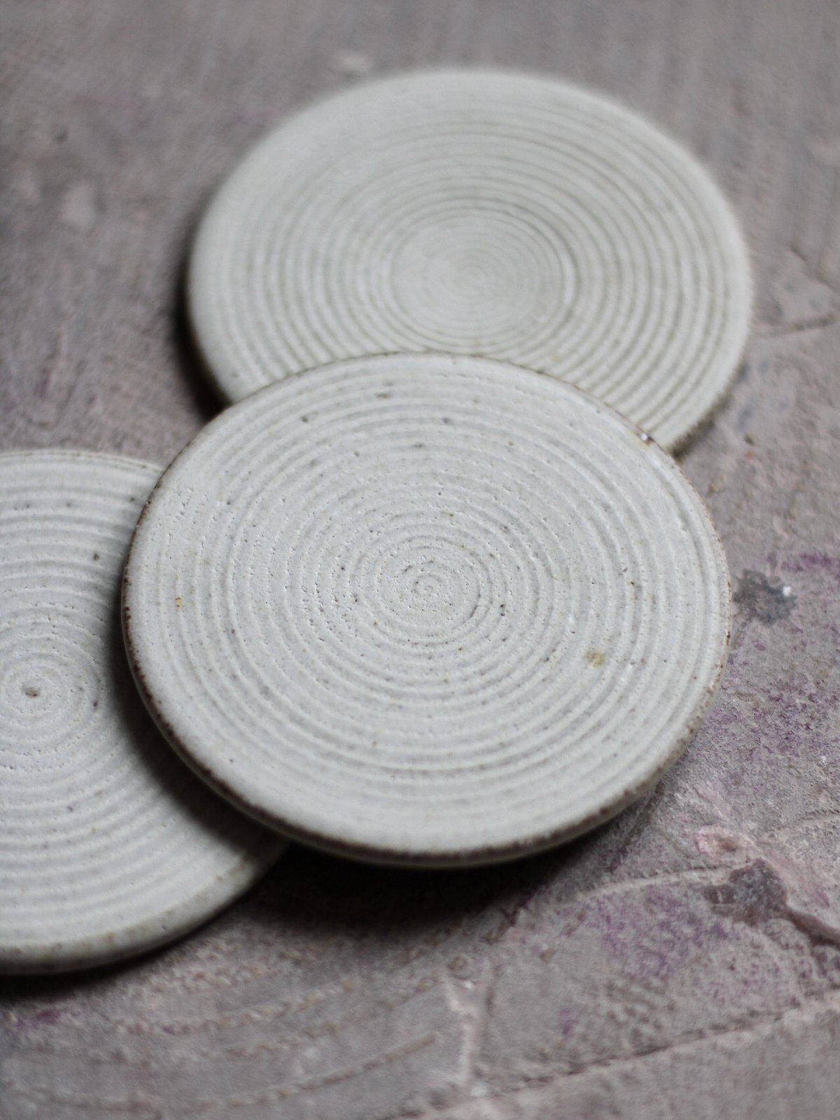 Image of coaster in textured ivory