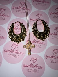 Large creoles and cross gold 