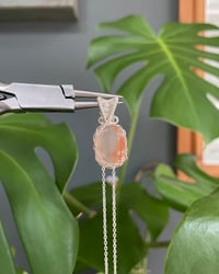 Image 1 of Silver Flower Agate Rounded Rectangle Crystal Necklace