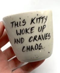 Image 2 of This kitty craves chaos in red