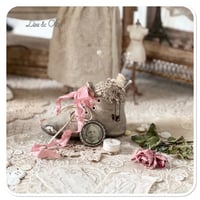 Image 1 of Handmade vintage childs boot pin cushion with a touch of pink