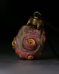 Image 4 of Egg of the King pendant, leather cord, brass hardware, all seeing glowing eyes