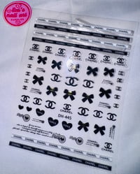 gold chanel bow sticker 