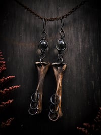 Image 3 of glass and bone