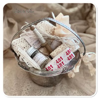 Image 4 of vintage style silver sugar bowl full of vintage French sewing notions